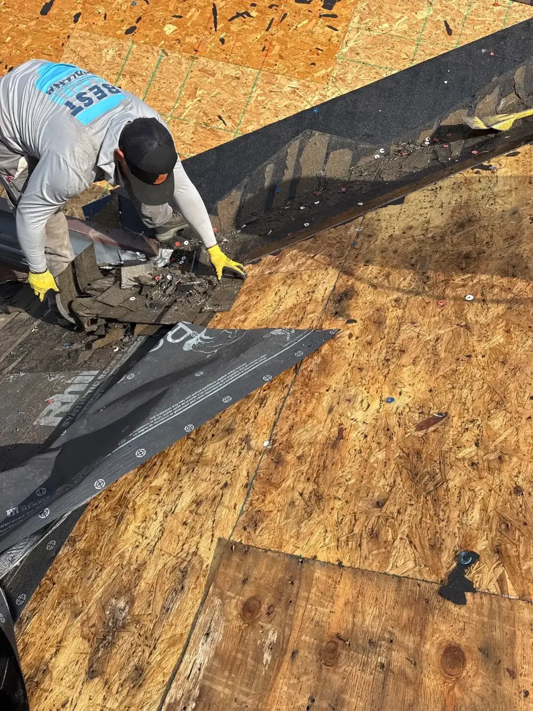 Tarping and dry-in on a Huntington commercial roof